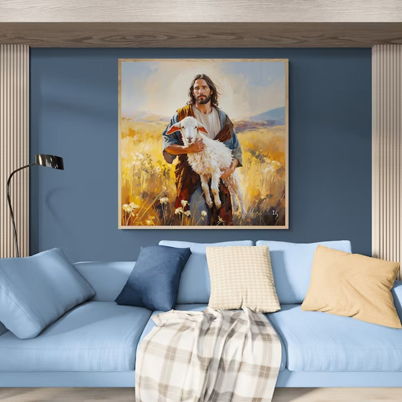 Home interior featuring a painting of Jesus as the shepherd, tenderly carrying a lamb, above a blue sofa accented with decorative pillows.