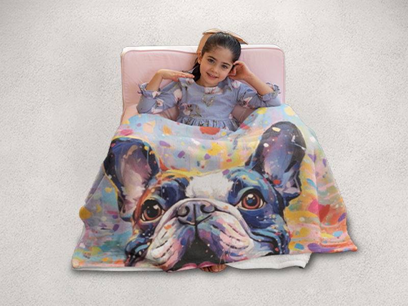 Cheerful and soft minky blanket, a young girl smiles behind a French Bulldog art print, perfect for a lively touch in children's rooms.