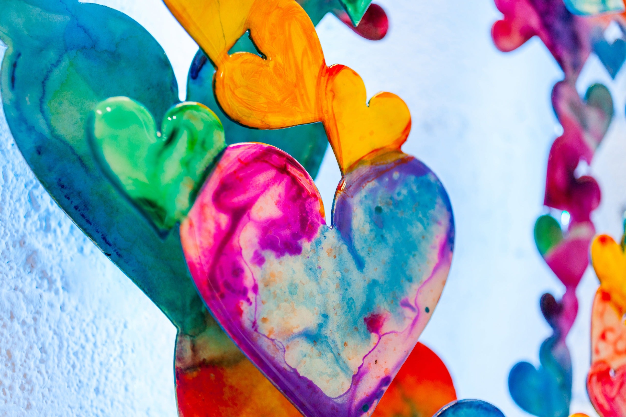 INFINITE LOVE canvas print in room setting - heart painting by Ivan Guaderrama