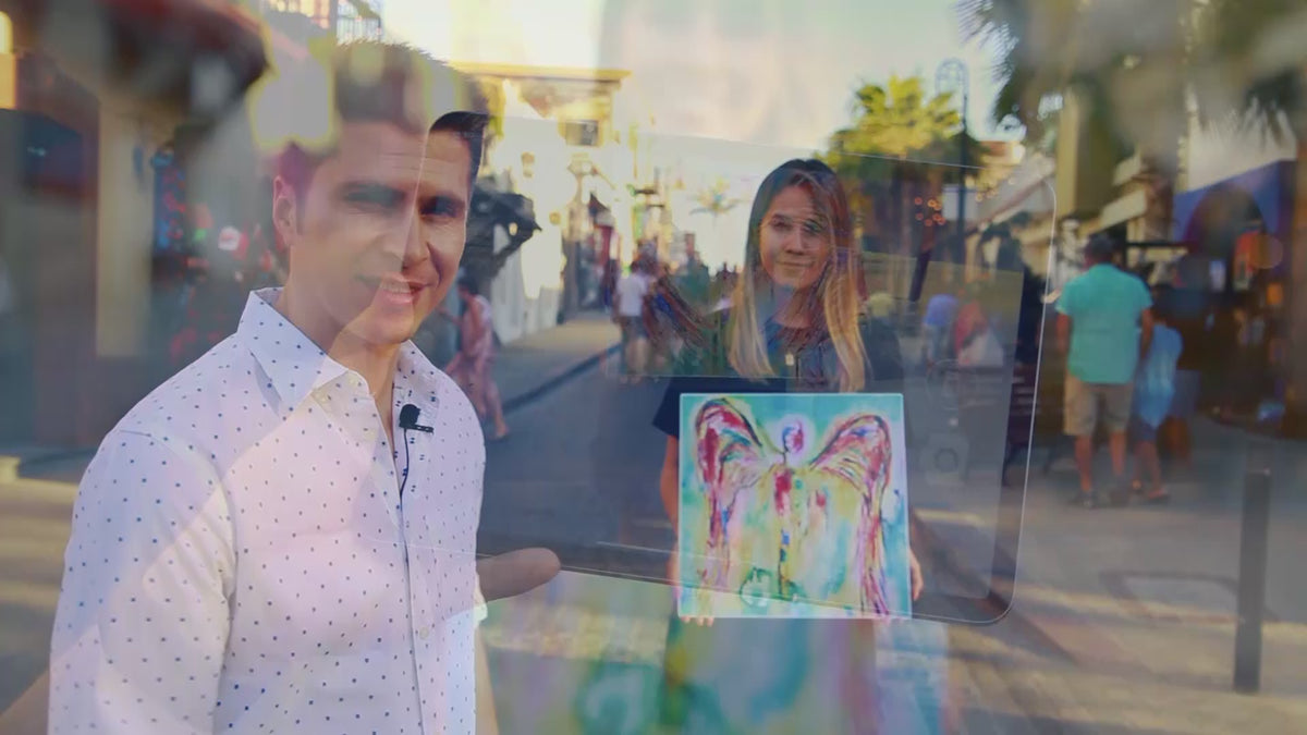 Ivan Guaderrama demonstrating augmented reality art on the San José del Cabo art walk