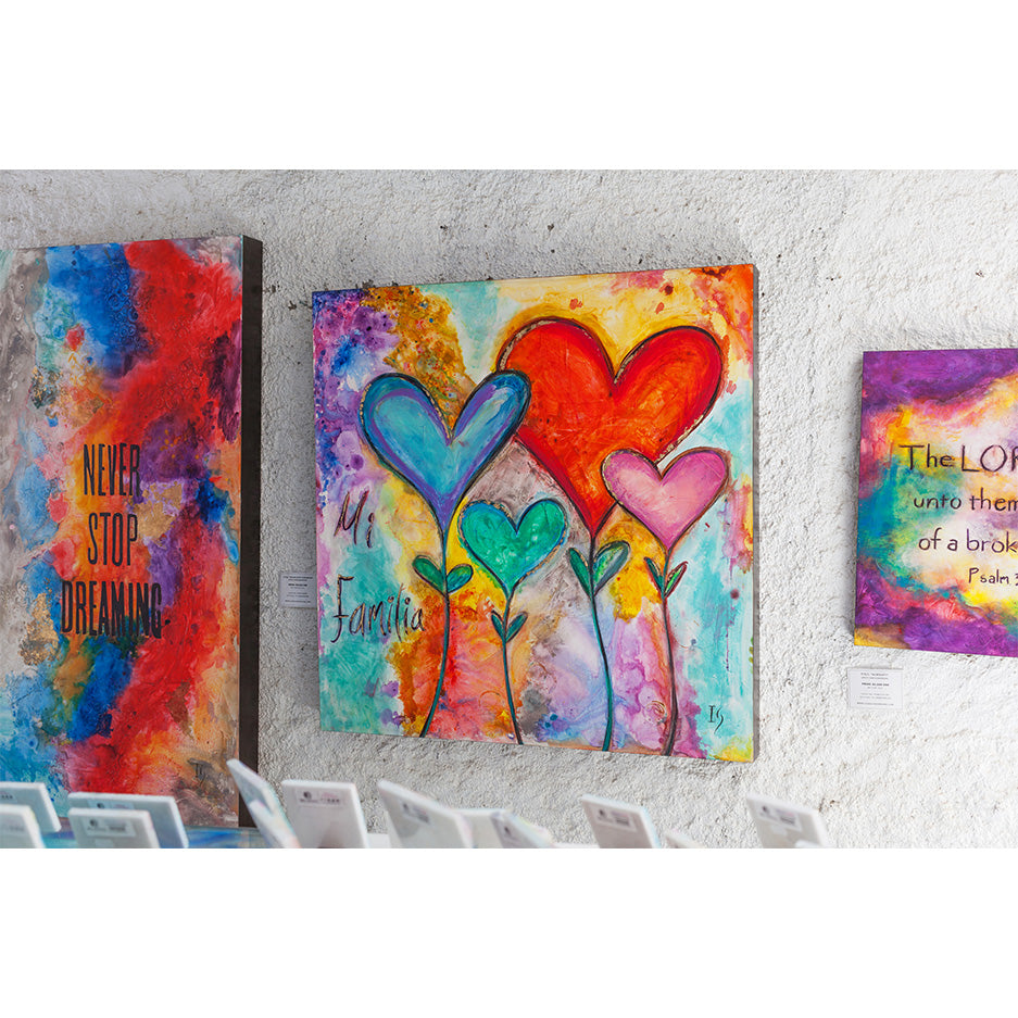 Family First canvas print in room setting - heart painting by Ivan Guaderrama