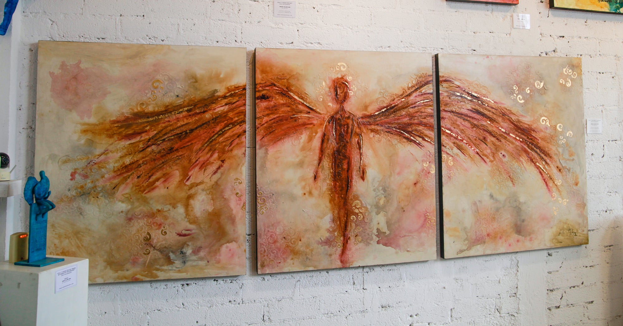 The Great Guardian canvas print in room setting - angel painting by Ivan Guaderrama
