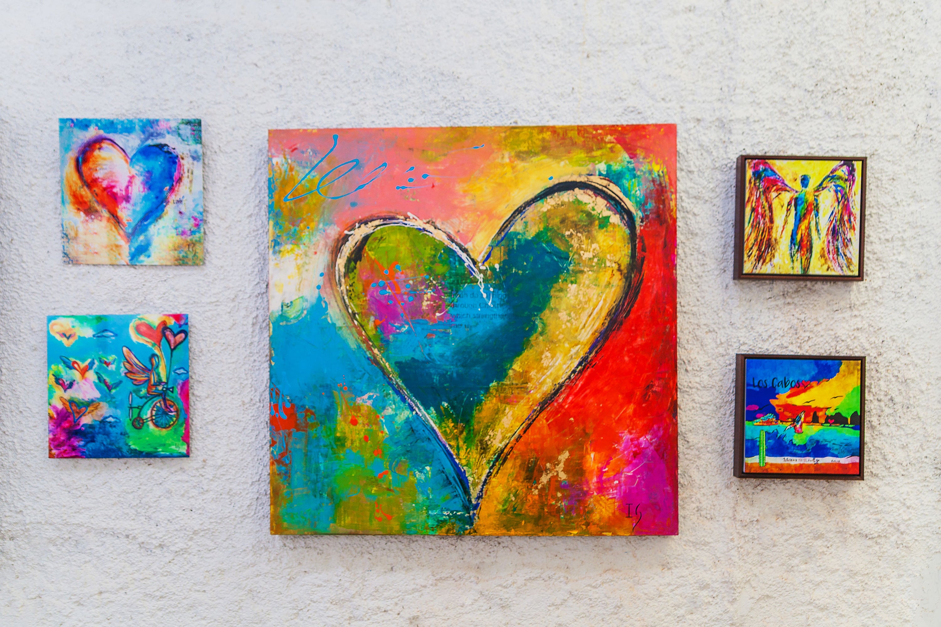 Unstoppable Heart canvas print in room setting - original painting by Ivan Guaderrama